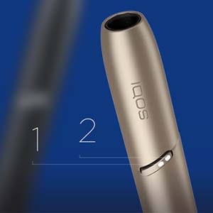 IQOS 3 DUO ierīces daļa ar cipariem 1 un 2, kas apzīmē turētāja gaismas.