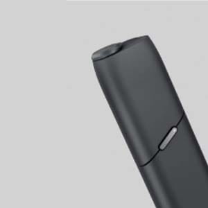 IQOS 3 MULTI на сером фоне.