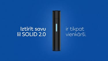 Stone Grey lil SOLID 2.0 ierīce ar spilgtu LED gaismu uz tumši zila fona
